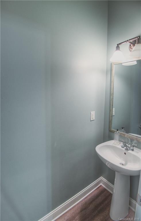 122 Mills Lane Fort Mill, SC 29708 - Photo 11 of 36 a bathroom with a sink and a mirror
