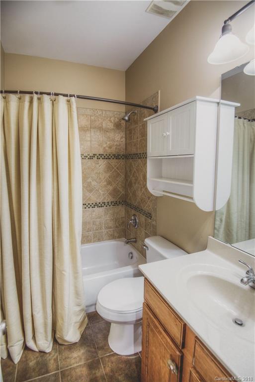 122 Mills Lane Fort Mill, SC 29708 - Photo 24 of 36 a bathroom with a sink toilet and shower