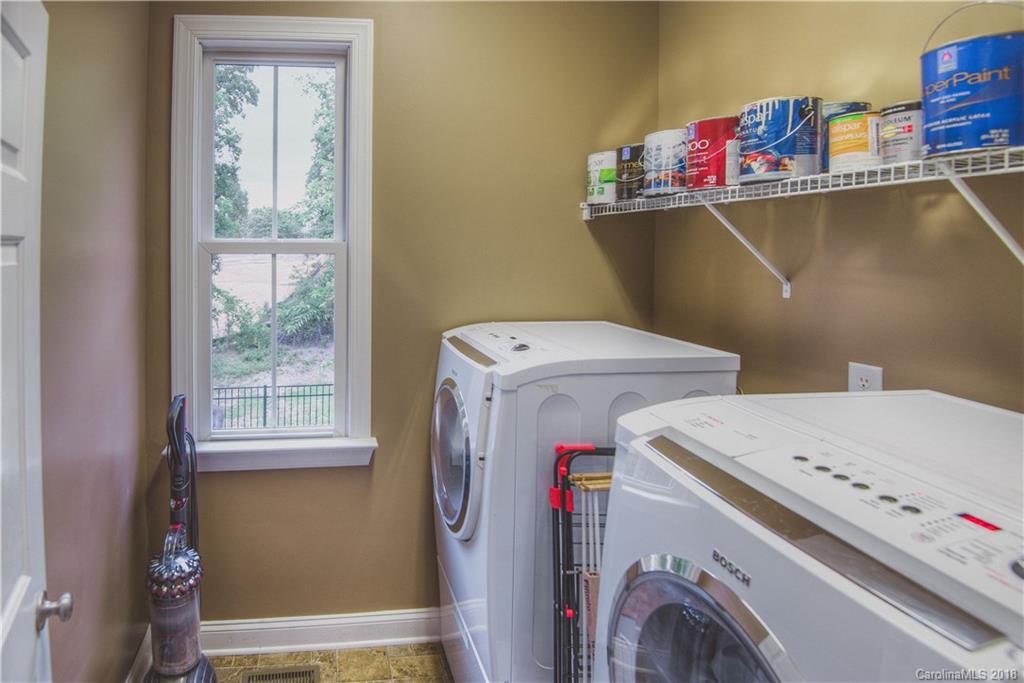 122 Mills Lane Fort Mill, SC 29708 - Photo 25 of 36 a utility room with dryer and washer