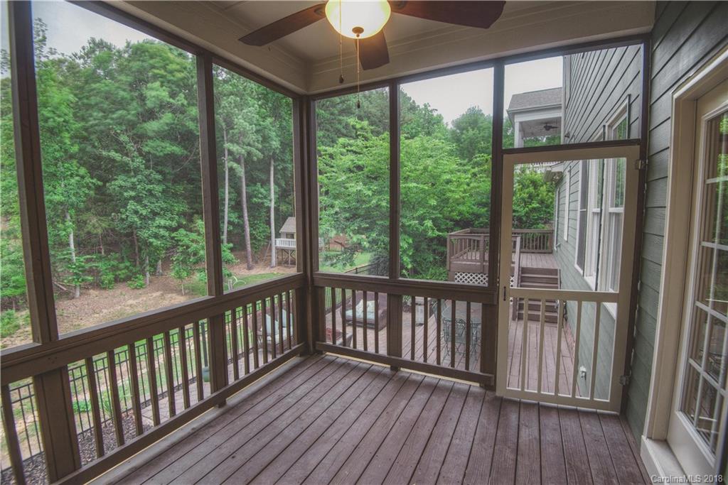 122 Mills Lane Fort Mill, SC 29708 - Photo 26 of 36 a view of a balcony with wooden floor