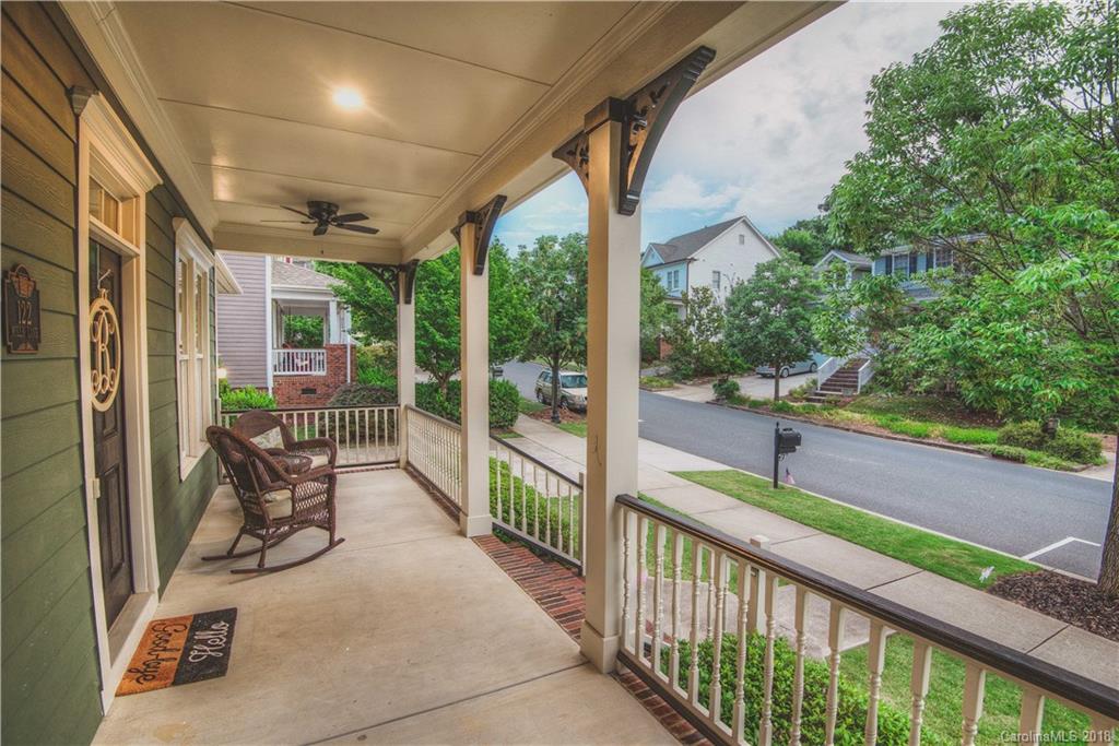 122 Mills Lane Fort Mill, SC 29708 - Photo 33 of 36 a view of a porch with chairs and backyard