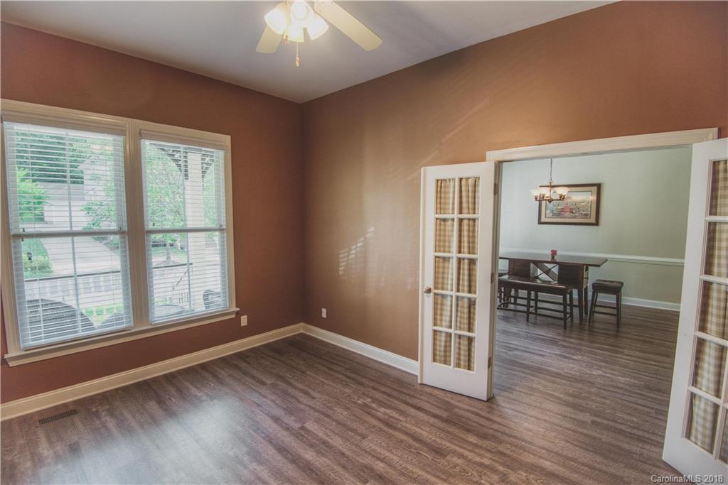 122 Mills Lane Fort Mill, SC 29708 - Photo 5 of 36 a view of livingroom with furniture wooden floor and window