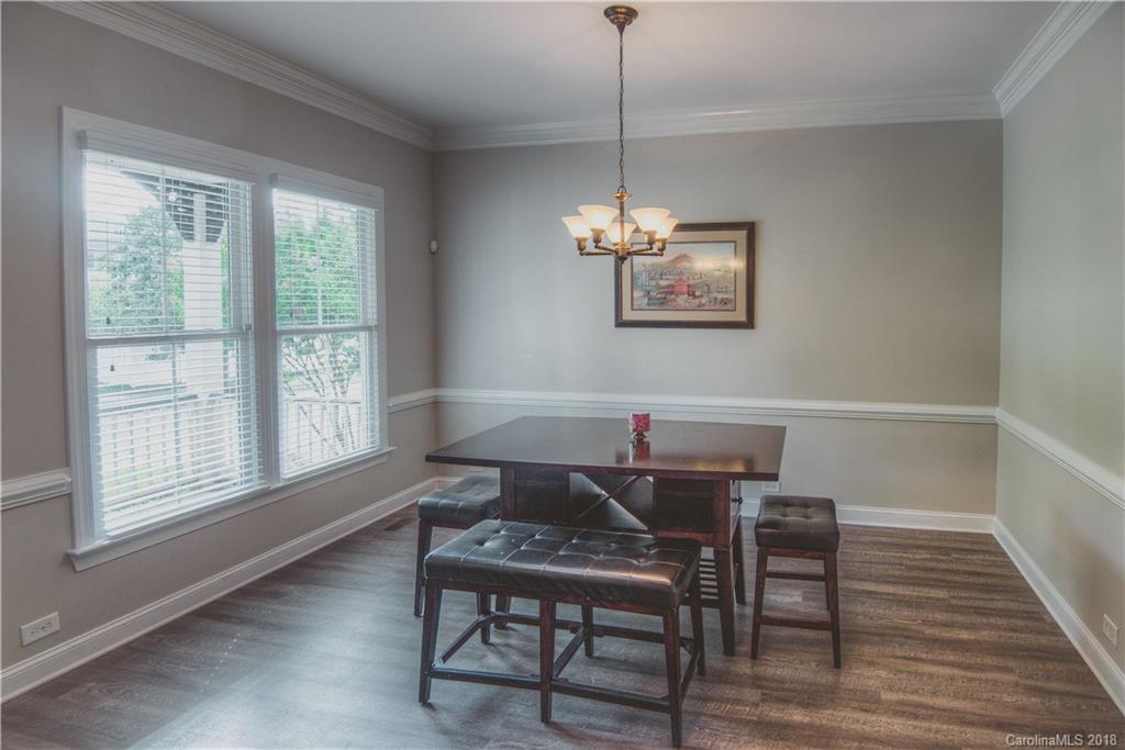 122 Mills Lane Fort Mill, SC 29708 - Photo 9 of 36 a view of a dining room with furniture window and outside view