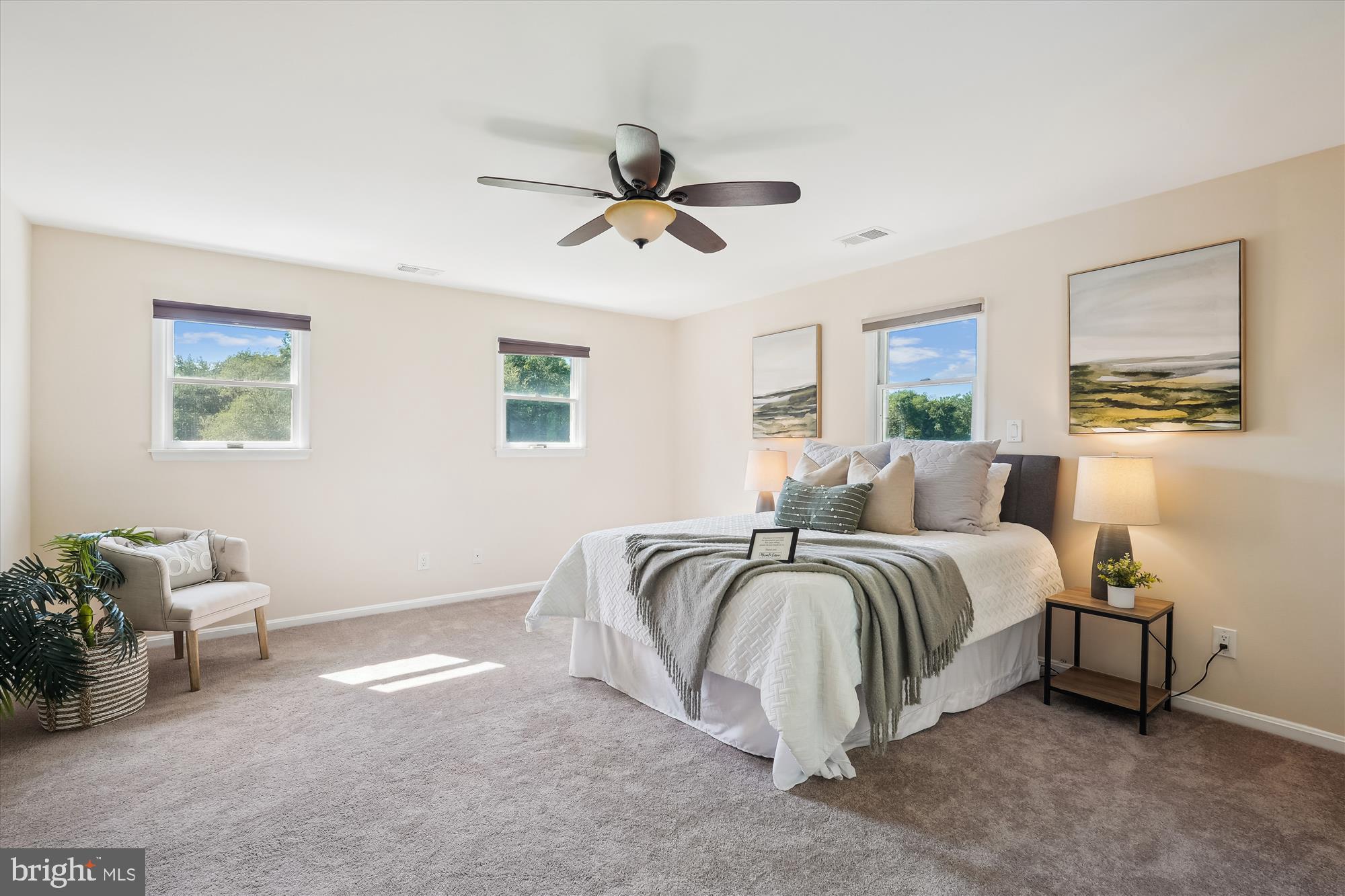 17721 Lisa Drive Derwood, MD 20855 - Photo 35 of 87 a spacious bedroom with a bed and ceiling fan
