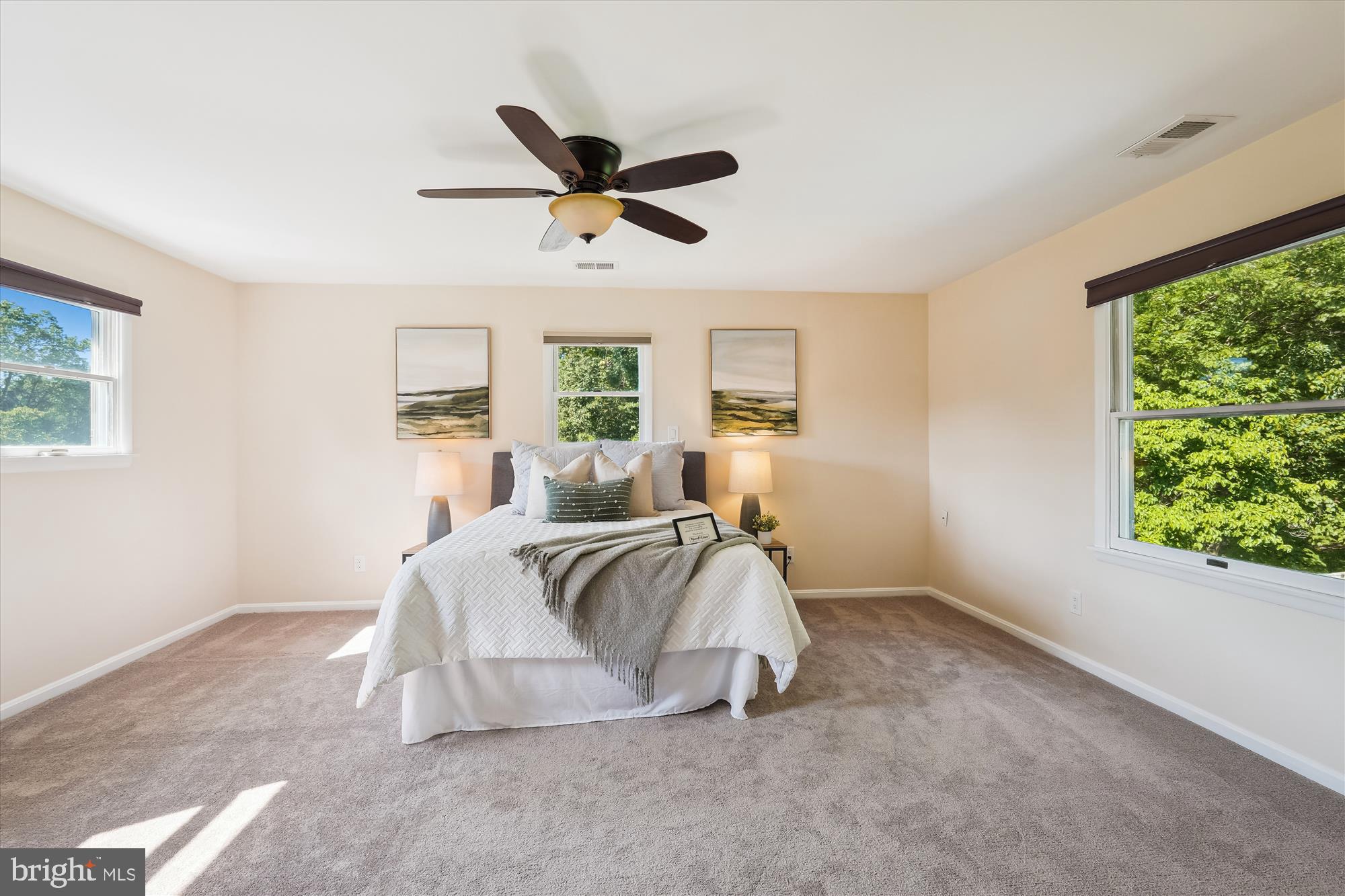 17721 Lisa Drive Derwood, MD 20855 - Photo 36 of 87 a spacious bedroom with a bed and window