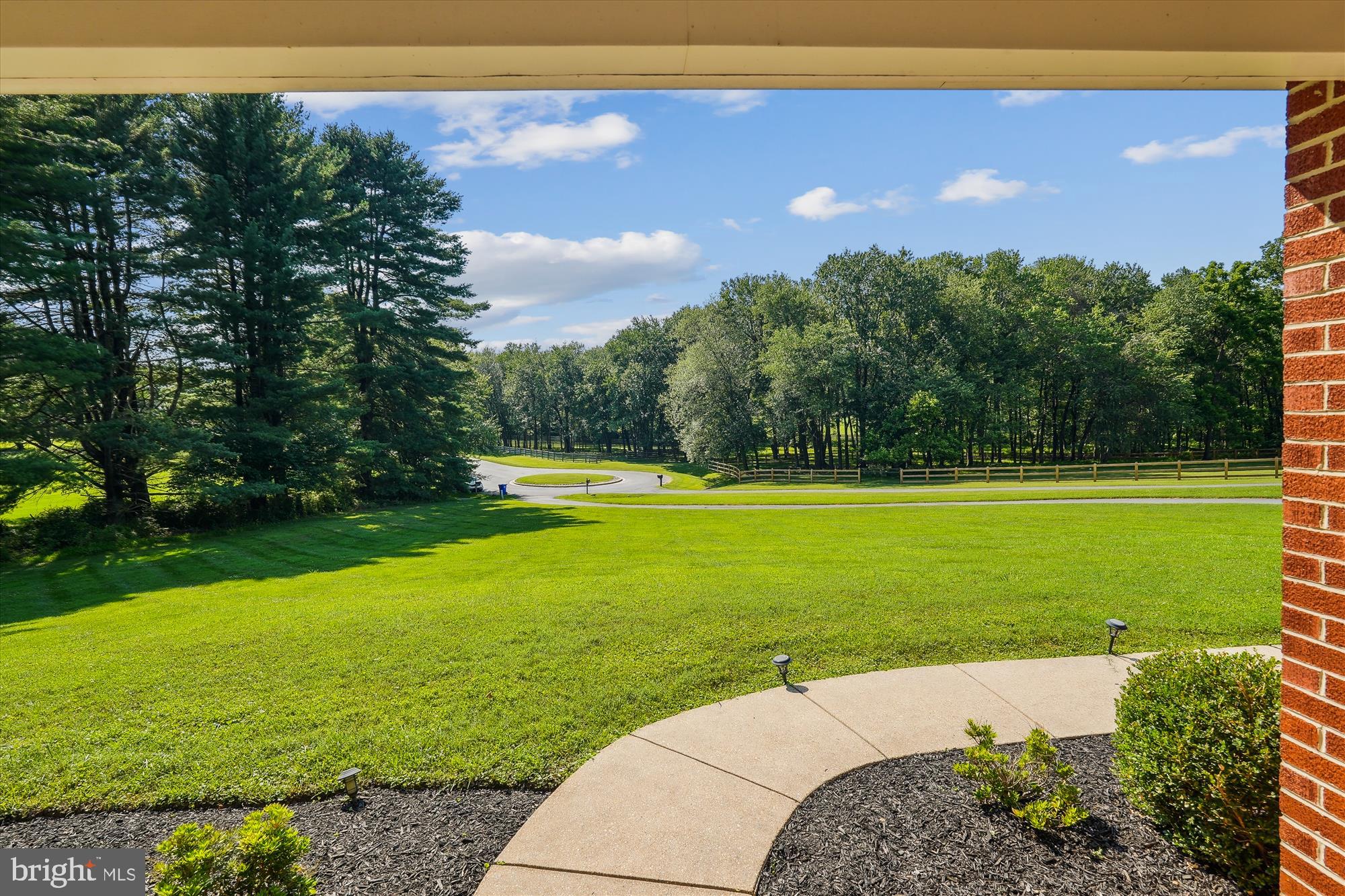 17721 Lisa Drive Derwood, MD 20855 - Photo 4 of 87 a view of a big yard with a large trees