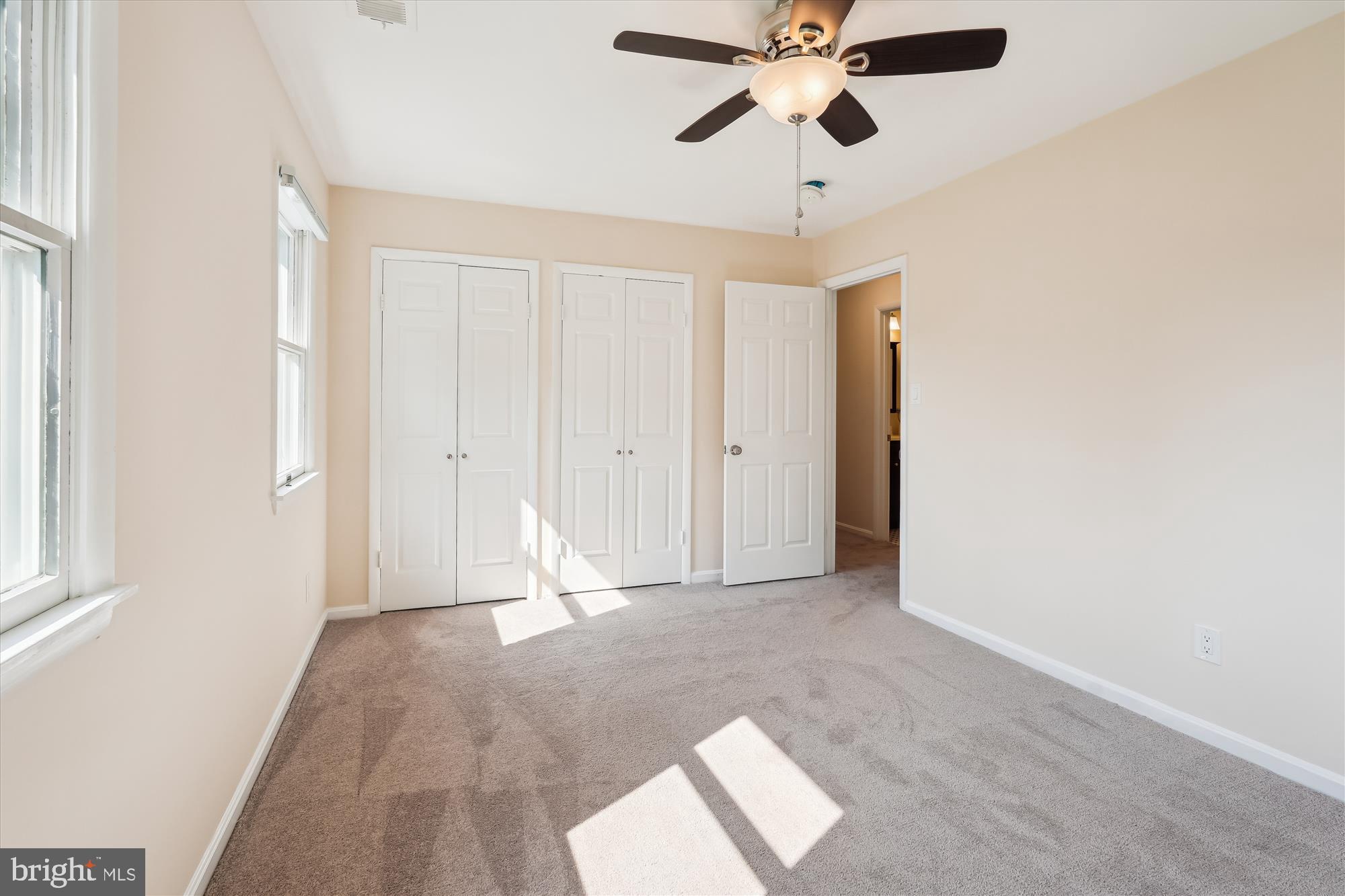 17721 Lisa Drive Derwood, MD 20855 - Photo 46 of 87 a view of an empty room with wooden floor and a window