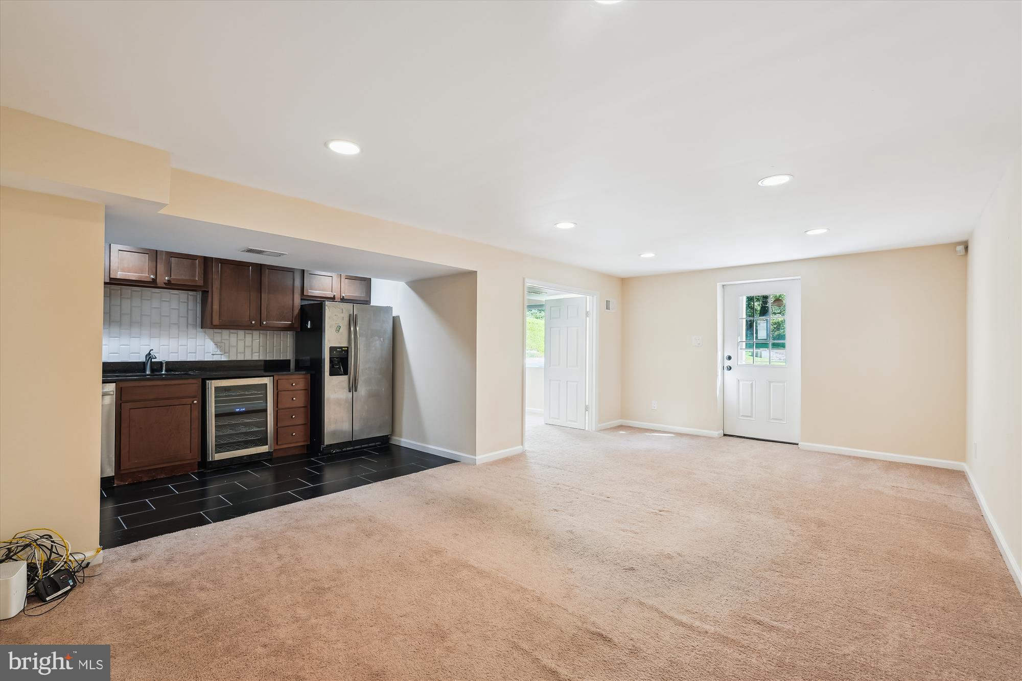 17721 Lisa Drive Derwood, MD 20855 - Photo 52 of 87 a view of a kitchen with stainless steel appliances granite countertop a stove and a sink
