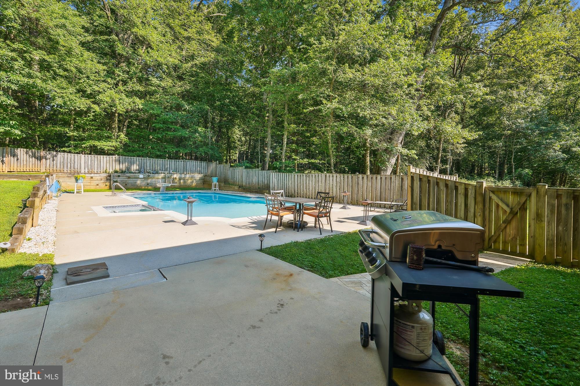 17721 Lisa Drive Derwood, MD 20855 - Photo 65 of 87 a view of a swimming pool and chairs