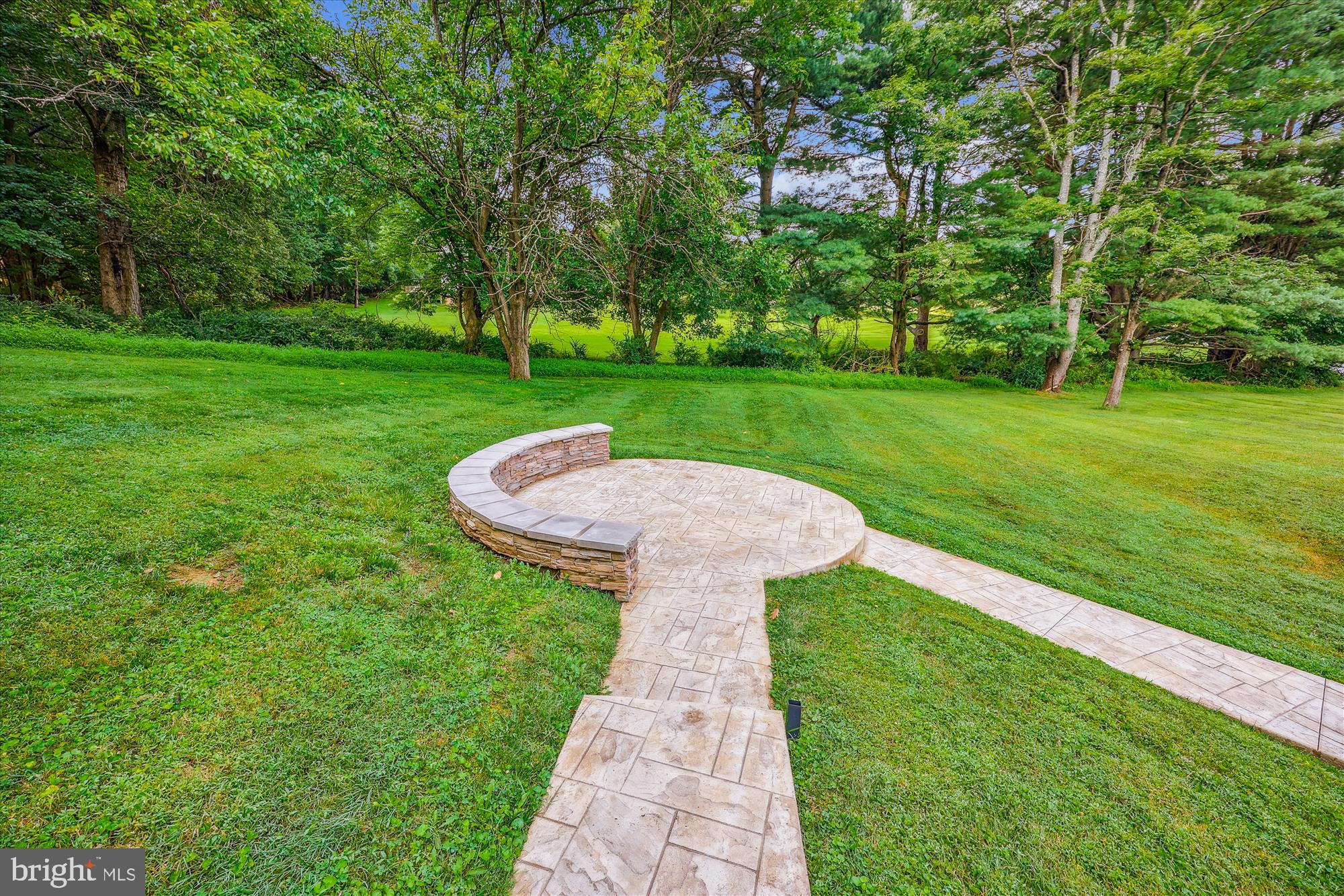 17721 Lisa Drive Derwood, MD 20855 - Photo 69 of 87 a view of a garden with a fountain
