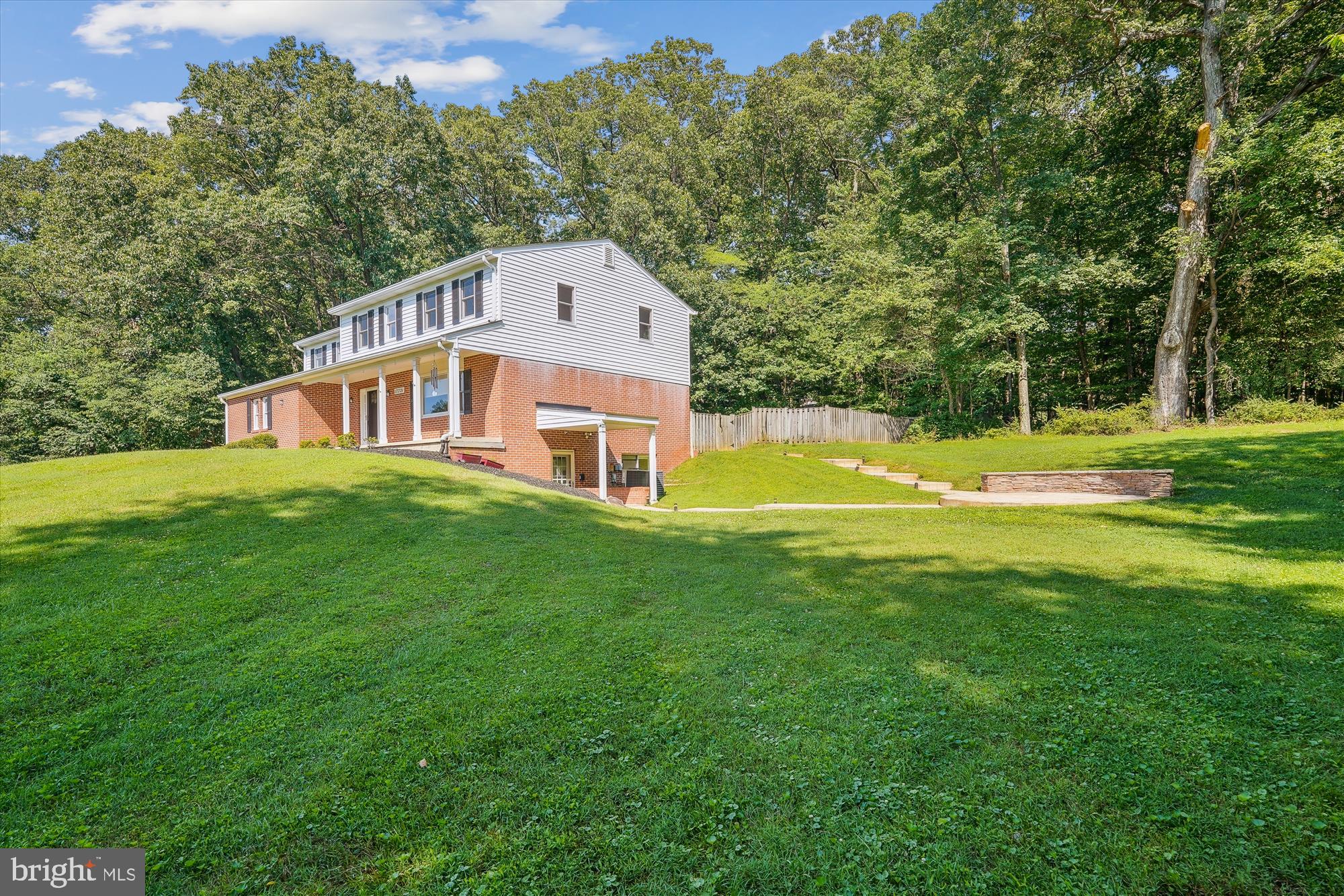 17721 Lisa Drive Derwood, MD 20855 - Photo 8 of 87 a view of a house with a backyard