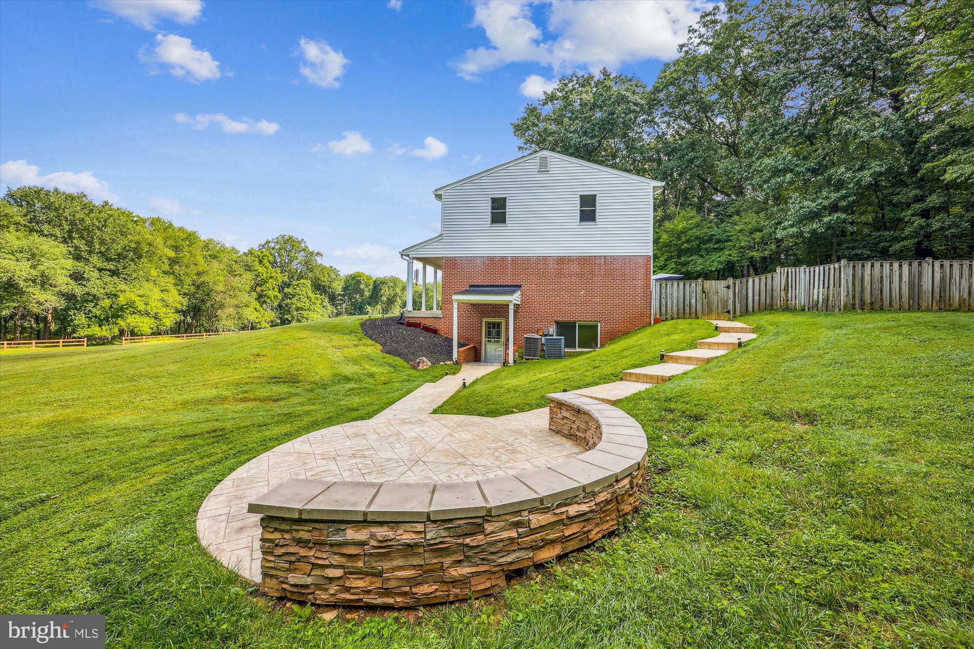 17721 Lisa Drive Derwood, MD 20855 - Photo 9 of 87 a view of a house with a yard potted plants and large tree
