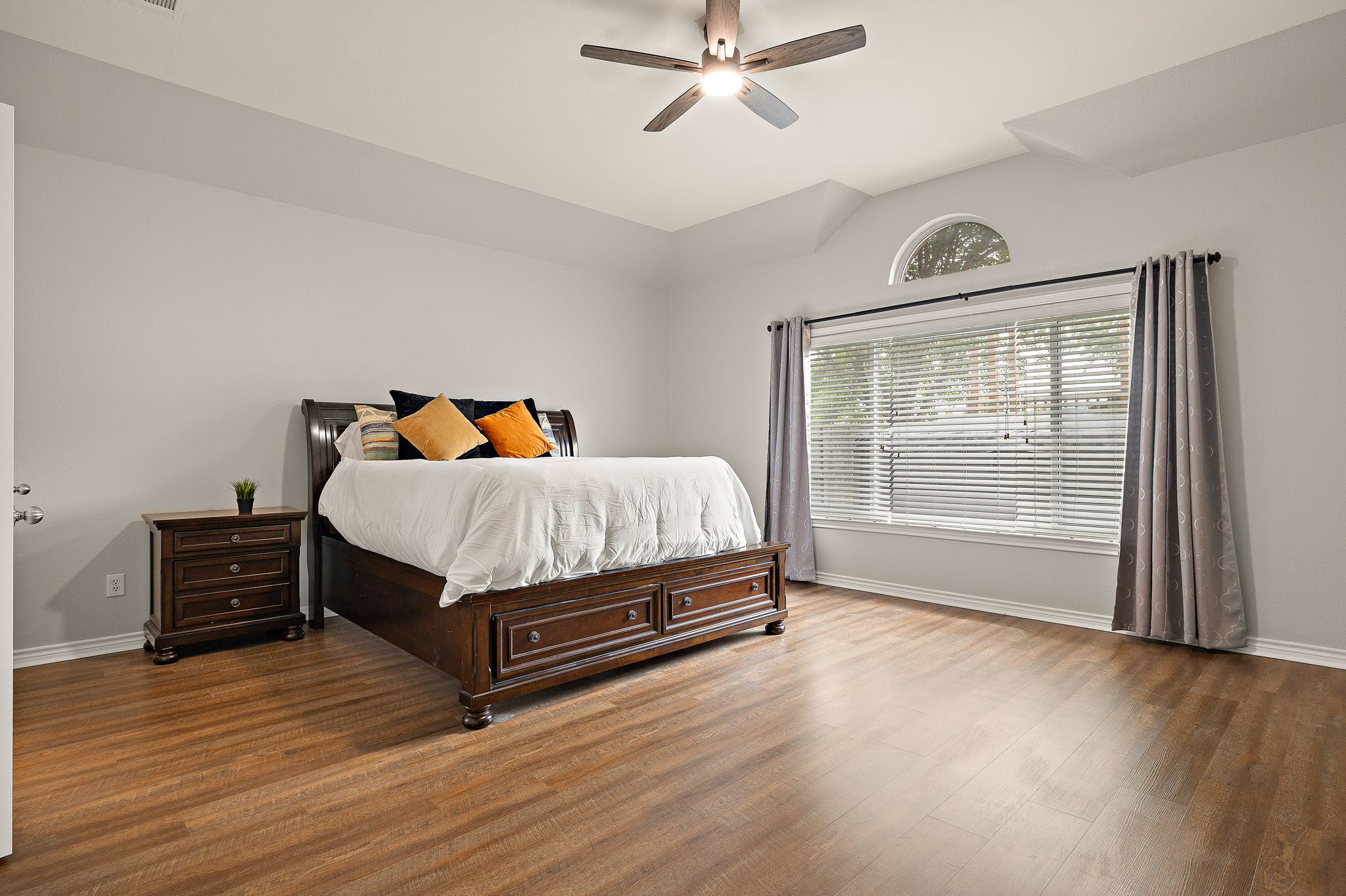 202 Nick Price Loop Round Rock, TX 78664 - Photo 16 of 39 a bedroom with a bed and window