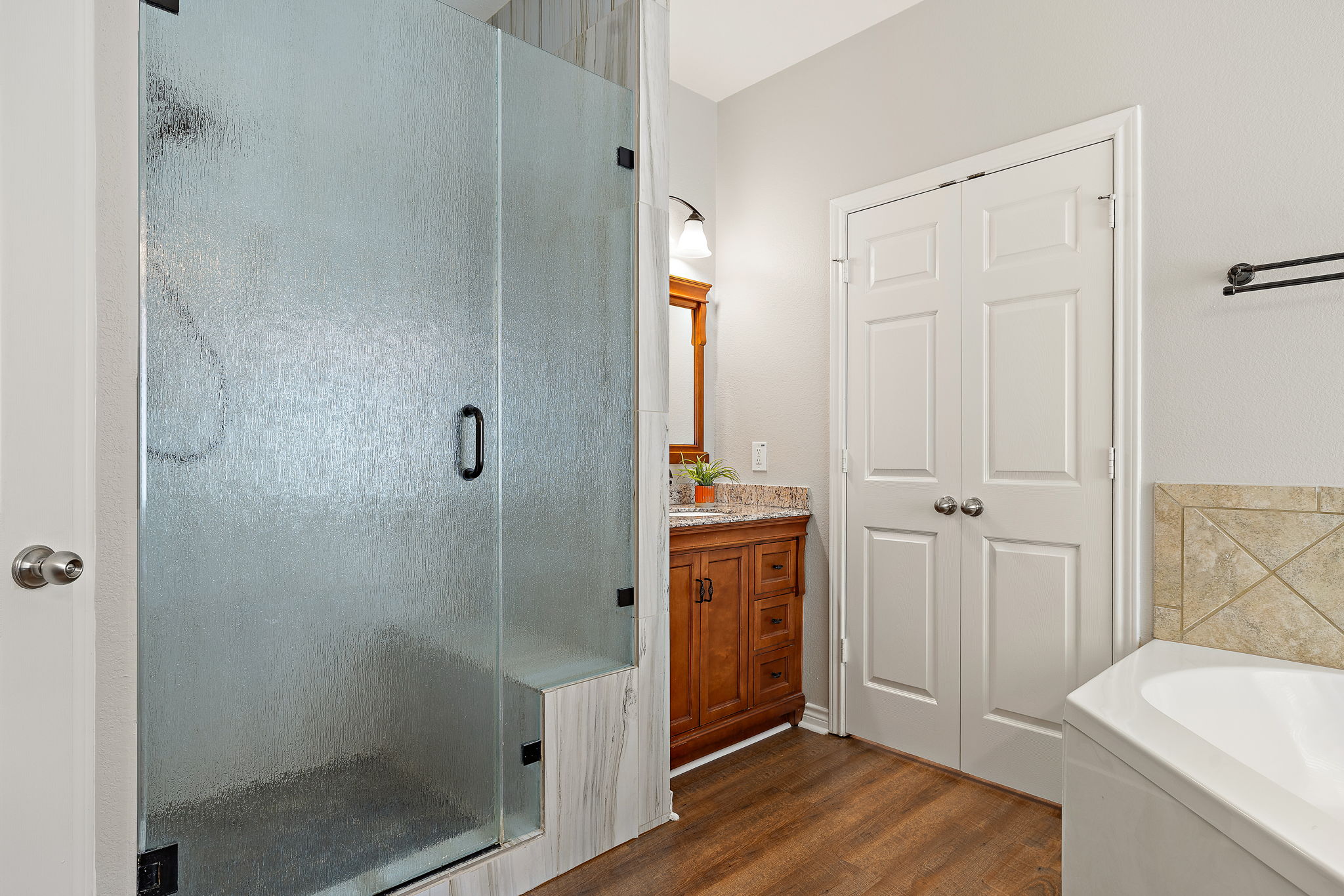 202 Nick Price Loop Round Rock, TX 78664 - Photo 18 of 39 a bathroom with a shower and a sink