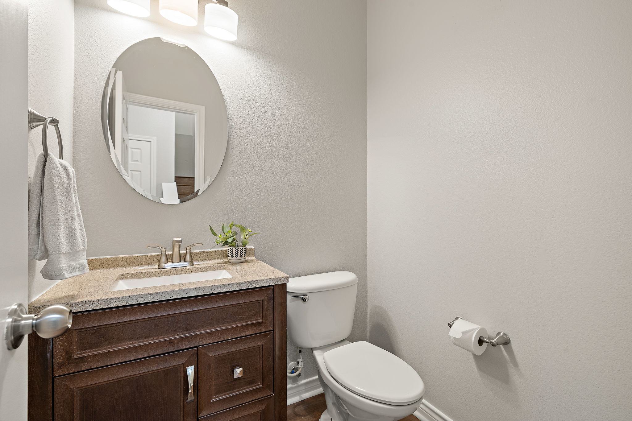 202 Nick Price Loop Round Rock, TX 78664 - Photo 21 of 39 a bathroom with a toilet a sink and mirror