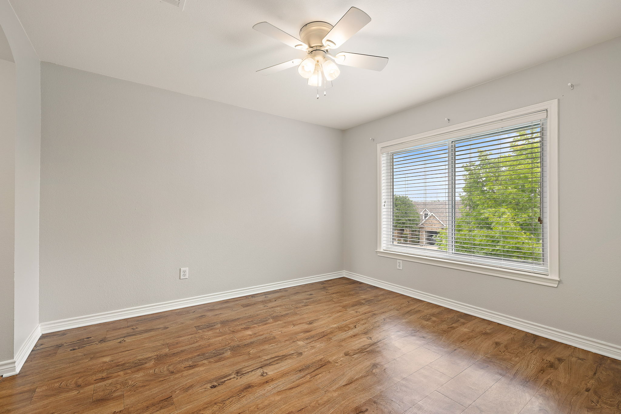 202 Nick Price Loop Round Rock, TX 78664 - Photo 28 of 39 wooden floor in an empty room with a window
