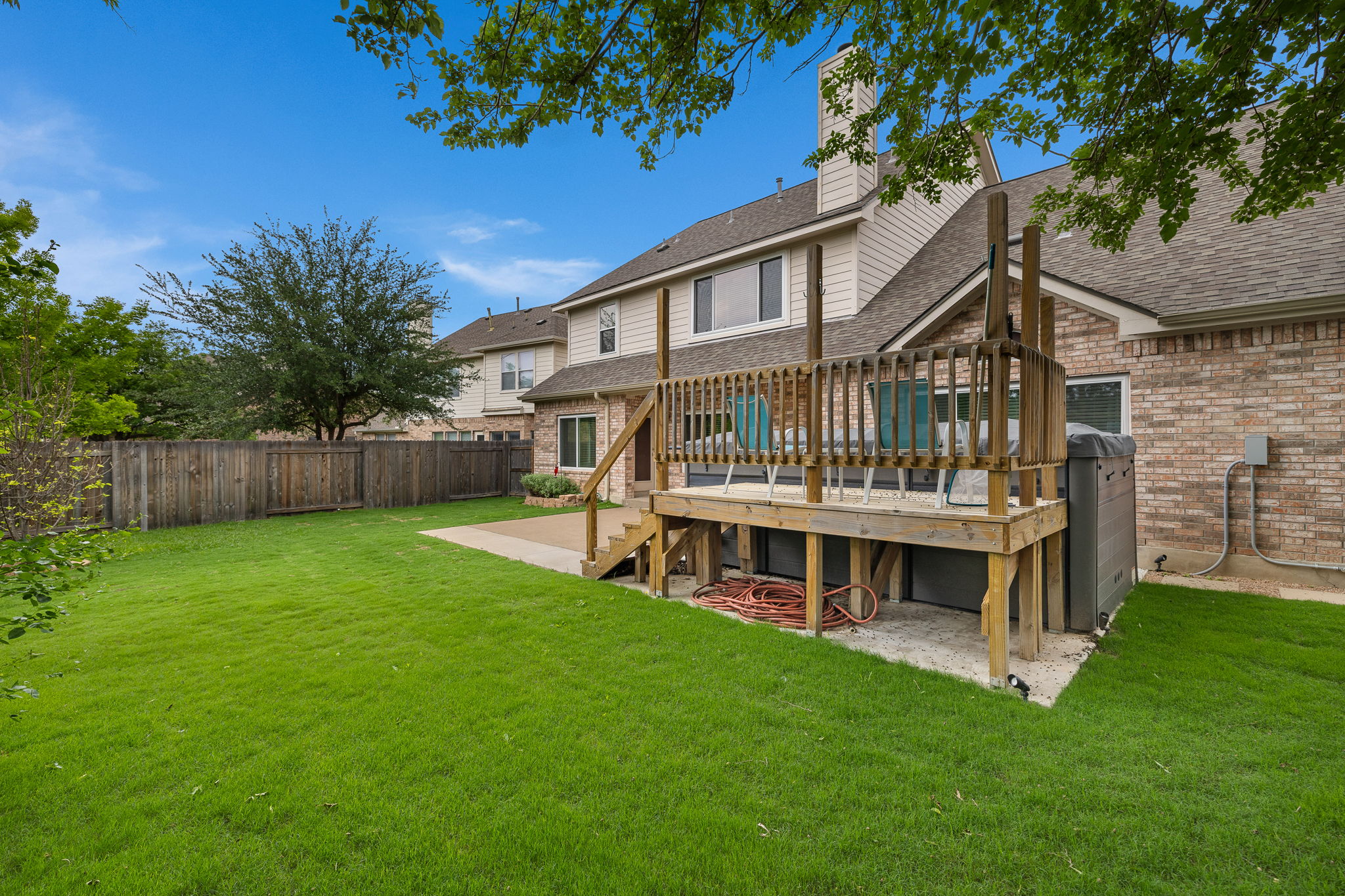 202 Nick Price Loop Round Rock, TX 78664 - Photo 35 of 39 a view of house with a big yard and large trees