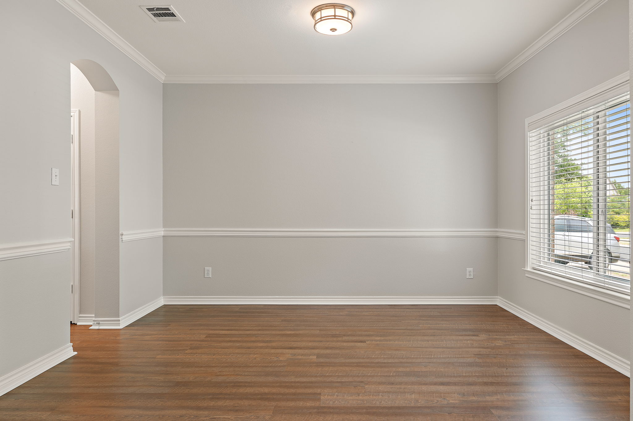 202 Nick Price Loop Round Rock, TX 78664 - Photo 6 of 39 a view of a room with wooden floor and window