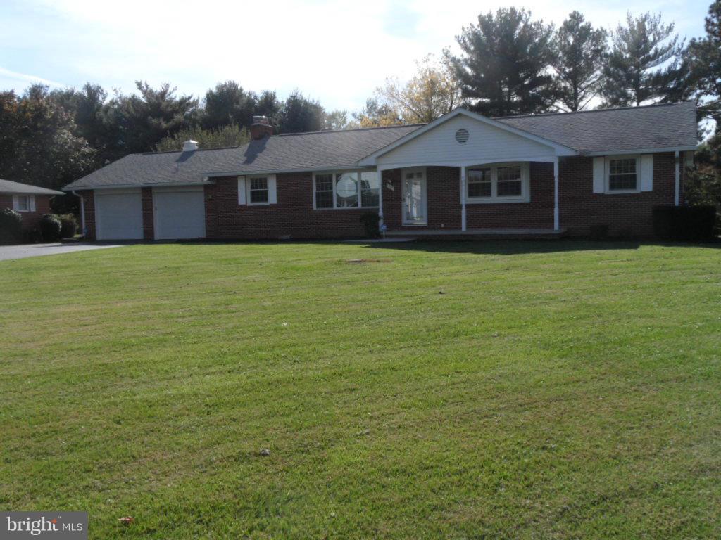 1405 Clearview Road Edgewood, MD 21040 - Photo 2 of 23 a front view of a house with a garden