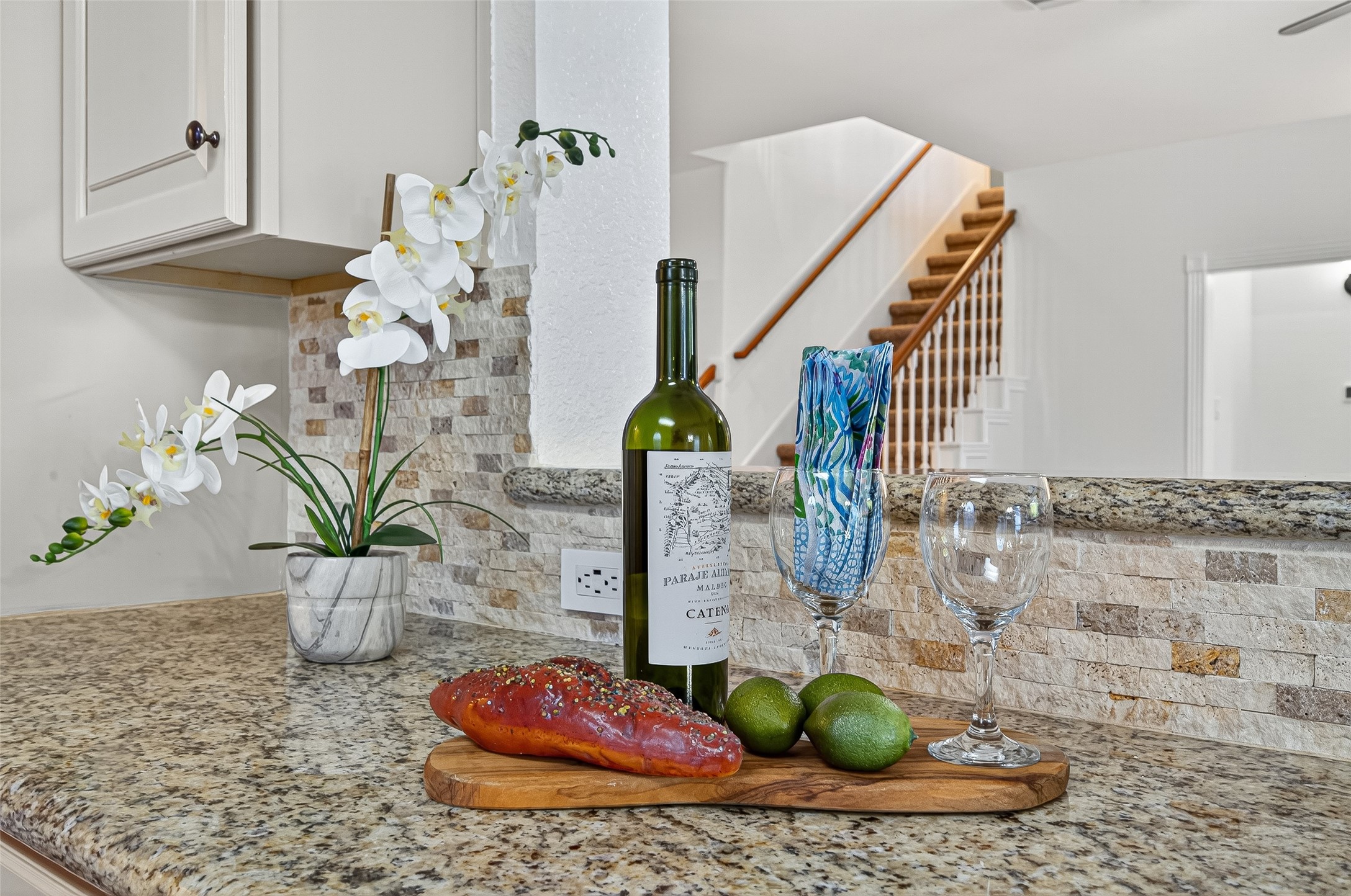 13011 Mossy Ridge Cove Houston, TX 77041 - Photo 22 of 50 Ideal for entertaining, the granite ledge offers a perfect space for serving guests.