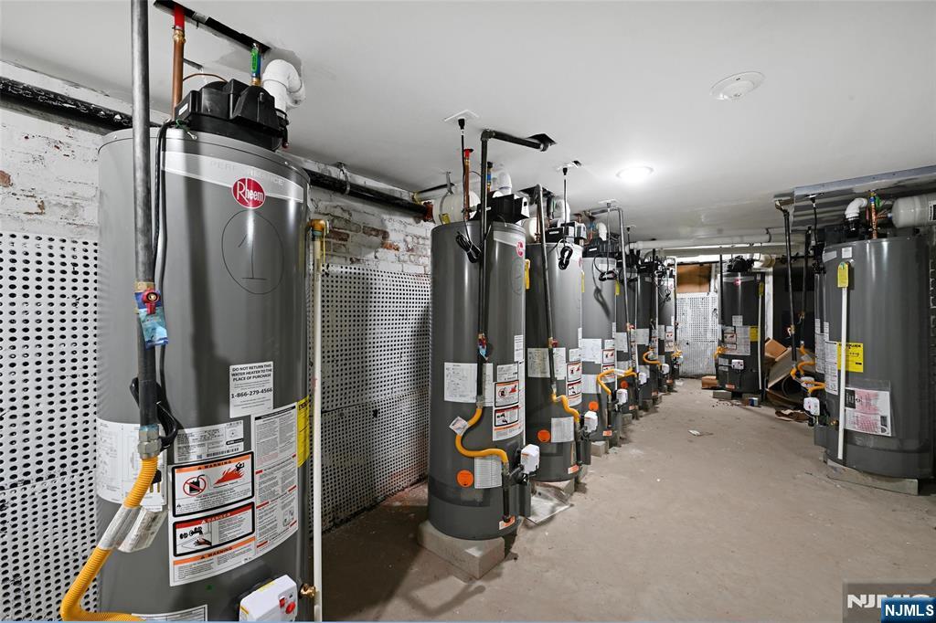 208 15th Street Jersey City, NJ 07310 - Photo 22 of 46 a view of a room with gym equipment