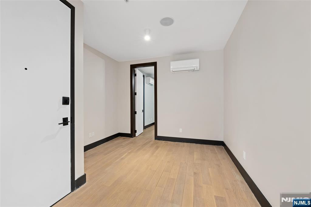 208 15th Street Jersey City, NJ 07310 - Photo 30 of 46 an empty room with closet