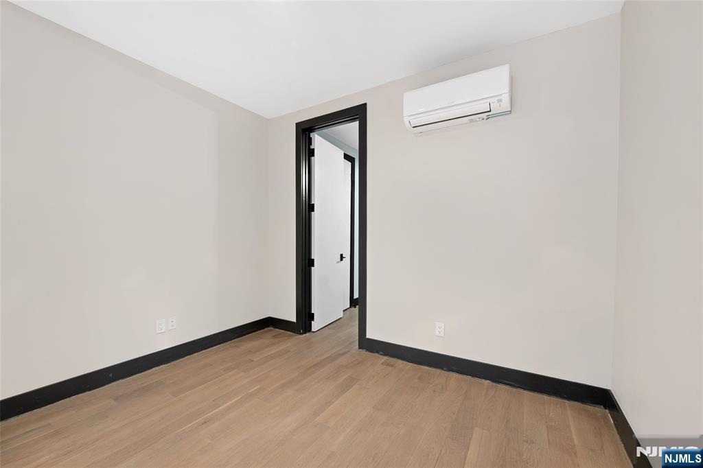 208 15th Street Jersey City, NJ 07310 - Photo 32 of 46 a view of an empty room