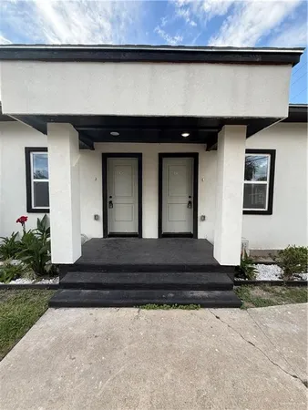 a front view of a house with entryway