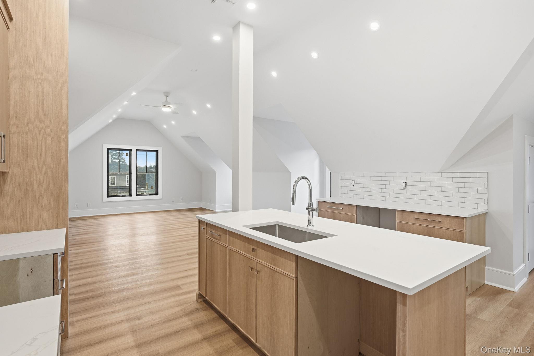 34 Clinton Avenue, Unit 10 Dobbs Ferry, NY 10522 - Photo 4 of 14 a kitchen with a sink cabinets and window