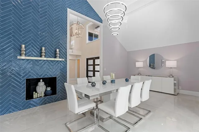 a view of a livingroom with furniture and a fireplace