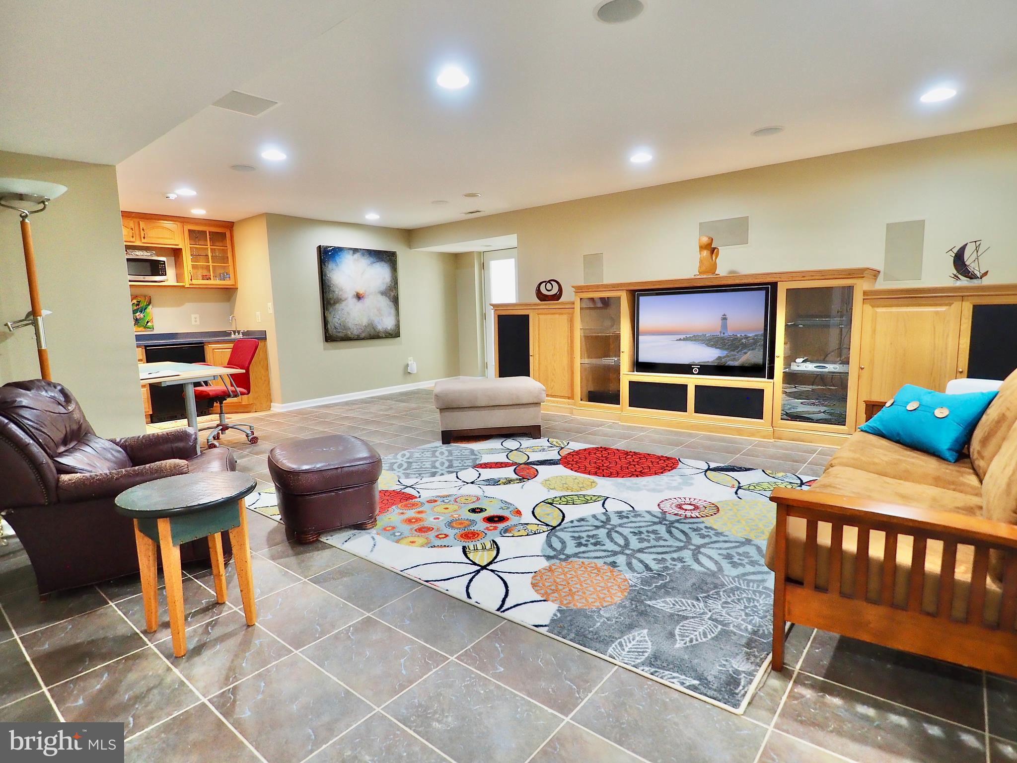 1312 Red Hawk Circle Reston, VA 20194 - Photo 39 of 48 Lower level w/built in media center & egress exit