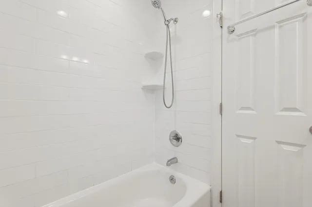 a utility room with sink dryer and washer