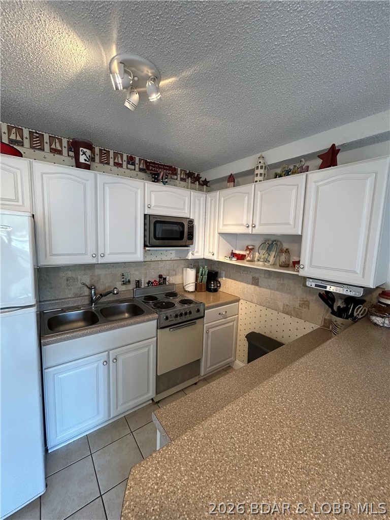 1442 Nichols Road, Unit D107 Osage Beach, MO 65065 - Photo 3 of 16