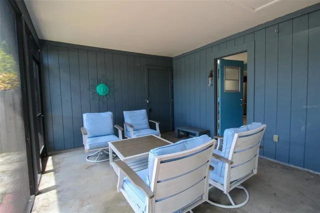 a bed room with a bed and furniture