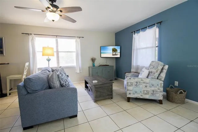 a living room with furniture and a window