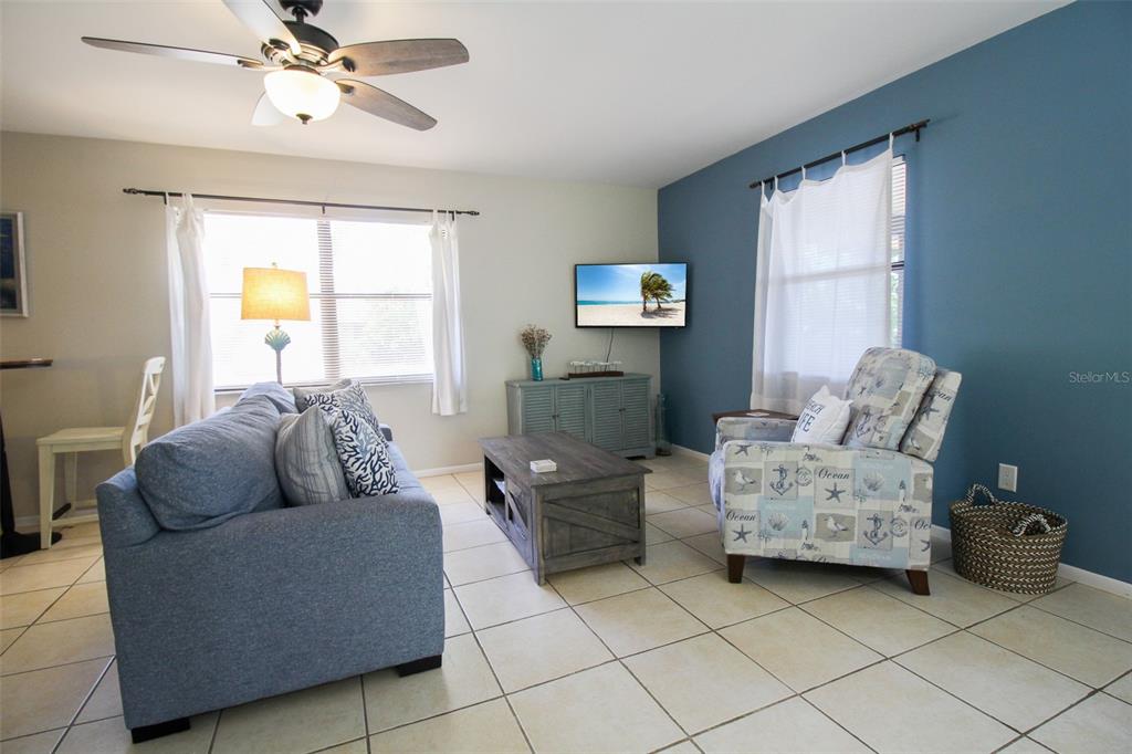 1116 Royal Road Venice, FL 34293 - Photo 7 of 26 a living room with furniture and a window