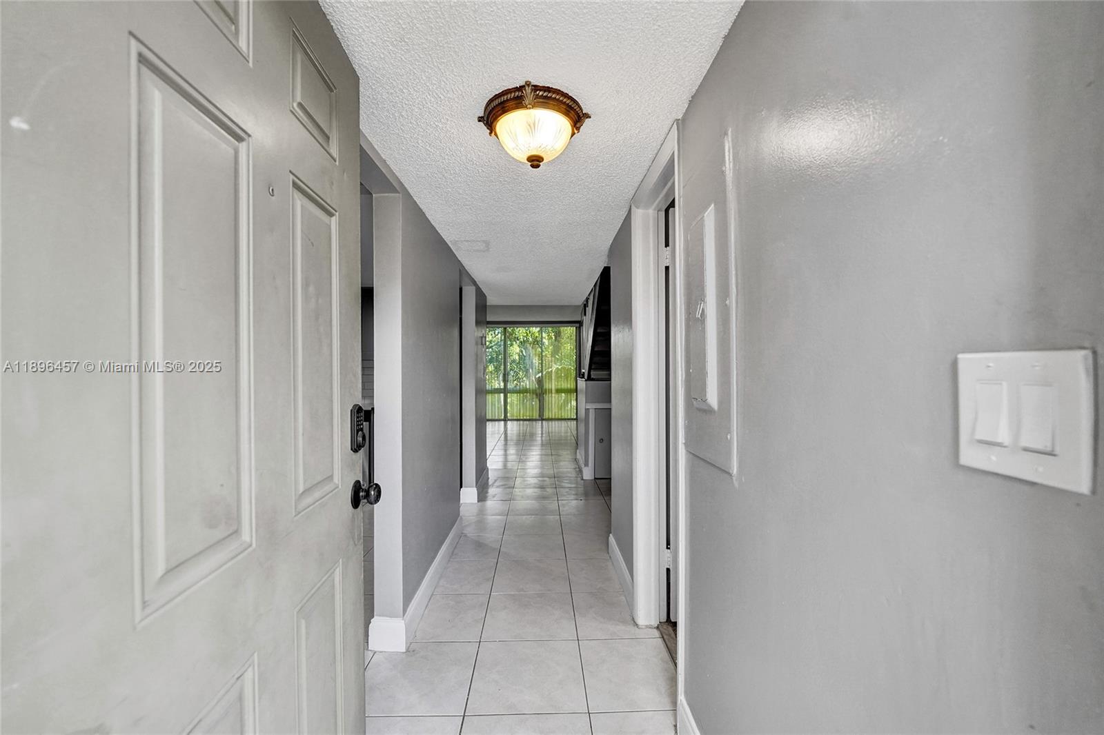 8401 West Sample Road, Unit 20 Coral Springs, FL 33065 - Photo 2 of 61 a view of entryway