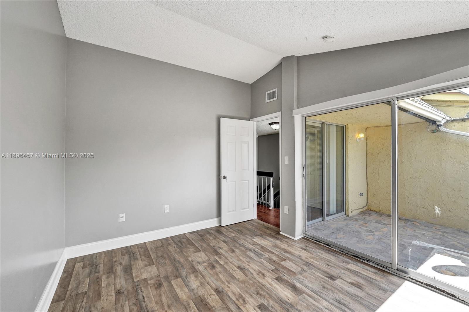 8401 West Sample Road, Unit 20 Coral Springs, FL 33065 - Photo 31 of 61 a view of an empty room