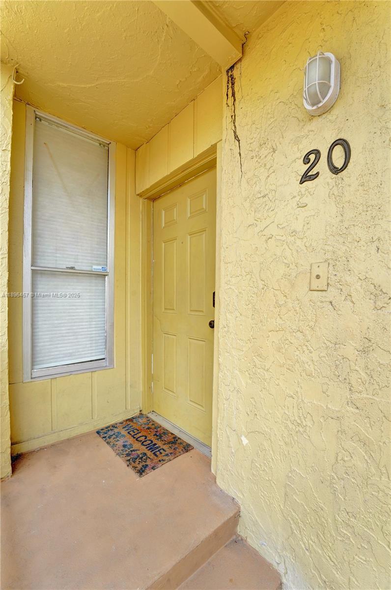 8401 West Sample Road, Unit 20 Coral Springs, FL 33065 - Photo 52 of 61 a bathroom with a window and a shower