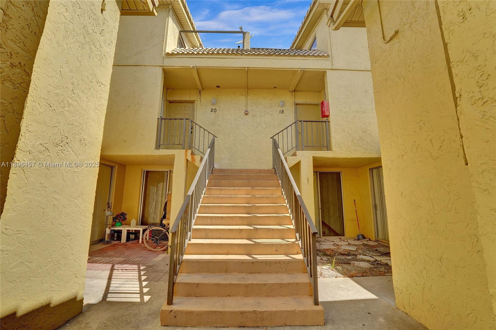 8401 West Sample Road, Unit 20 Coral Springs, FL 33065 - Photo 53 of 61 a view of entryway with a front door