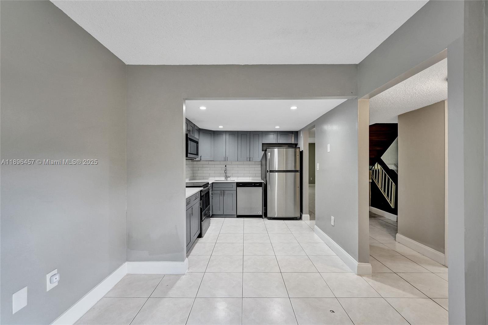 8401 West Sample Road, Unit 20 Coral Springs, FL 33065 - Photo 9 of 61 a view of a kitchen with a sink