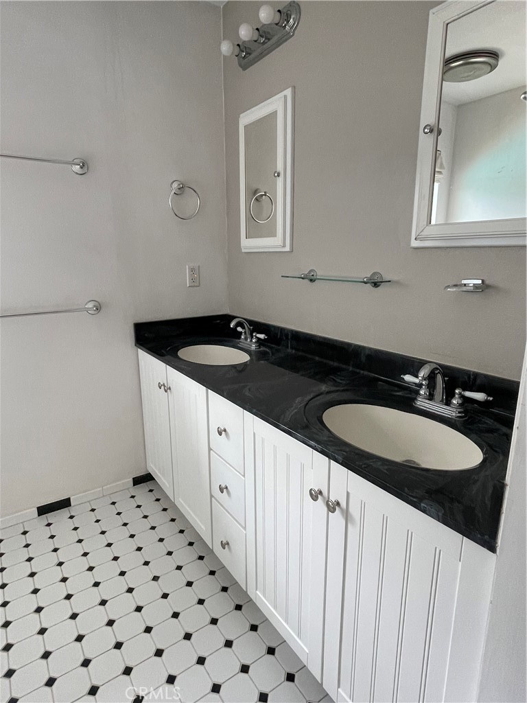 658 David Court Merced, CA 95340 - Photo 12 of 18 a kitchen with a sink and cabinets