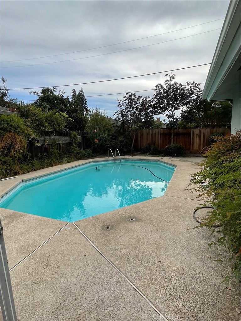 658 David Court Merced, CA 95340 - Photo 18 of 18 a view of a swimming pool and a yard