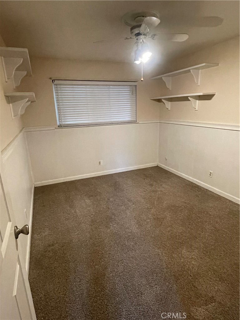 658 David Court Merced, CA 95340 - Photo 9 of 18 an empty room with shelves