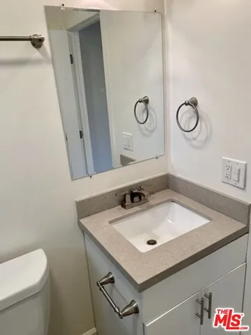 a bathroom with a sink and a toilet