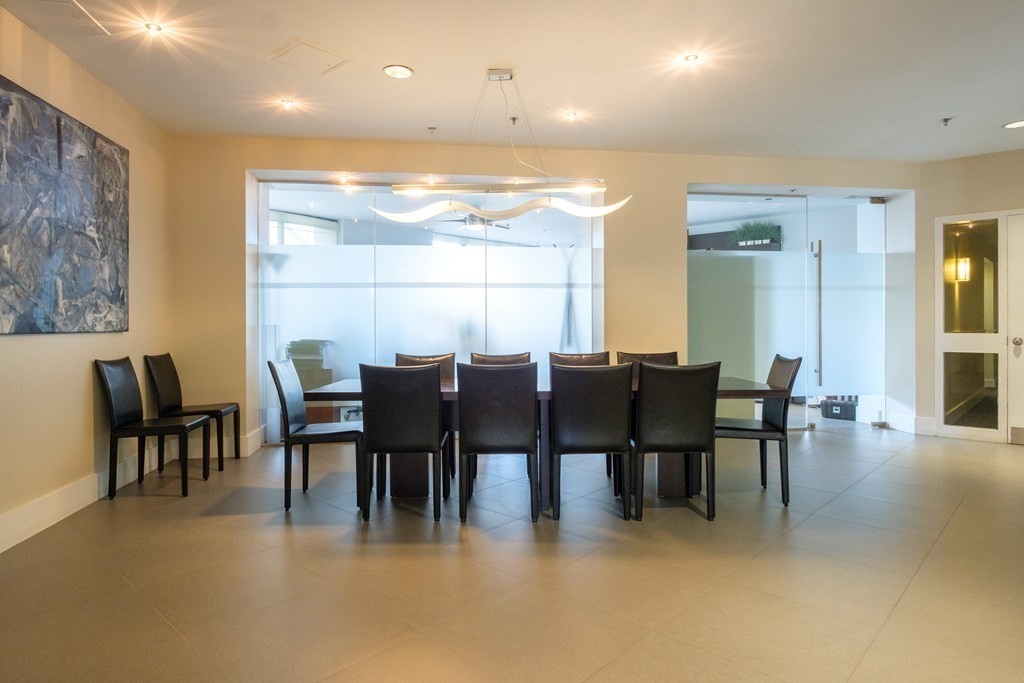 15 North Beacon Street, Unit 217 Boston, MA 02134 - Photo 12 of 21 a view of a dining room with furniture