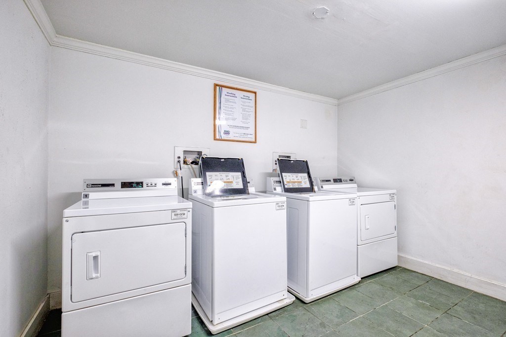 15 North Beacon Street, Unit 217 Boston, MA 02134 - Photo 20 of 21 a utility room with dryer and washer