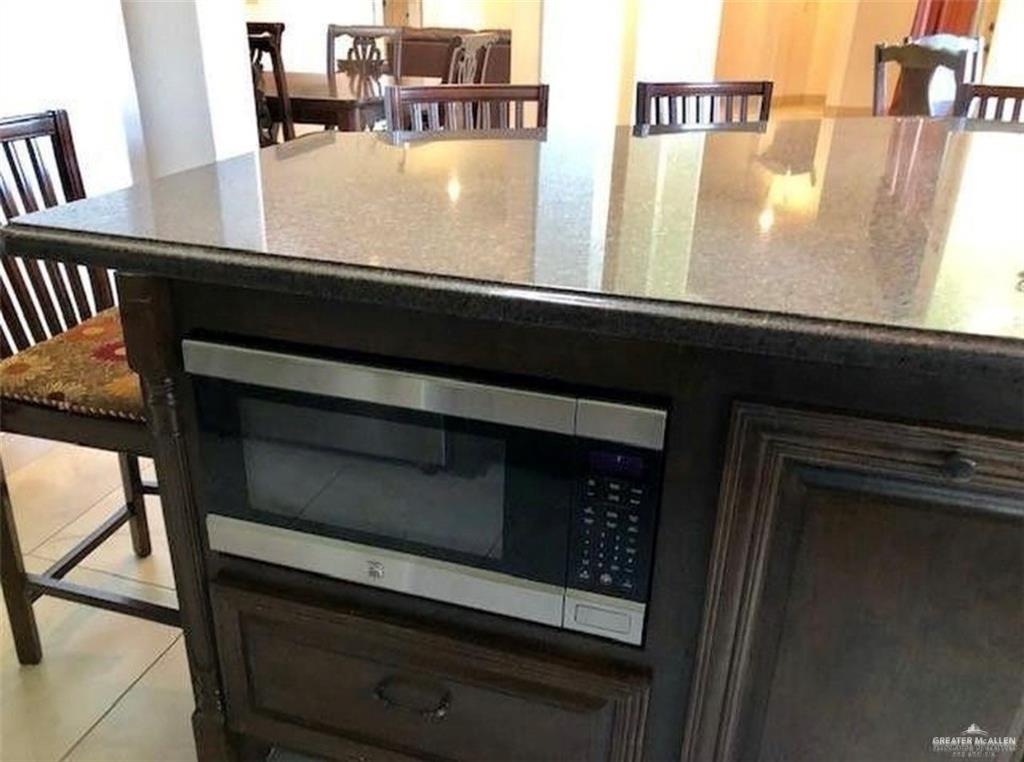 2720 Fairmont Avenue McAllen, TX 78504 - Photo 13 of 35 a close view of sink and microwave