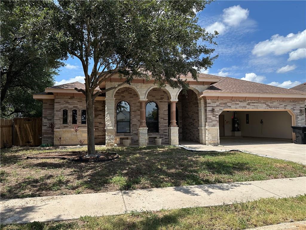 2720 Fairmont Avenue McAllen, TX 78504 - Photo 2 of 35 a front view of a house with a yard