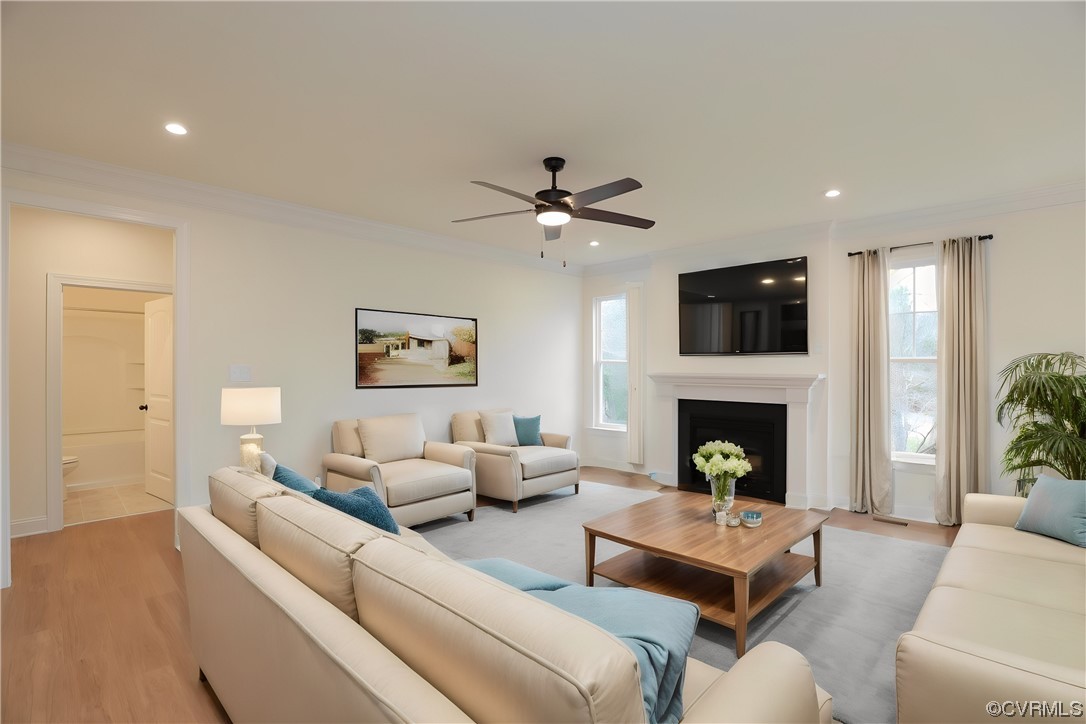 4357 Landfall Drive Williamsburg, VA 23185 - Photo 12 of 44 a living room with furniture and a fireplace